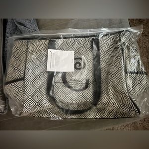 Brand new in bag, Thirty-One Cindy tote/laptop bag. Initial letter C.